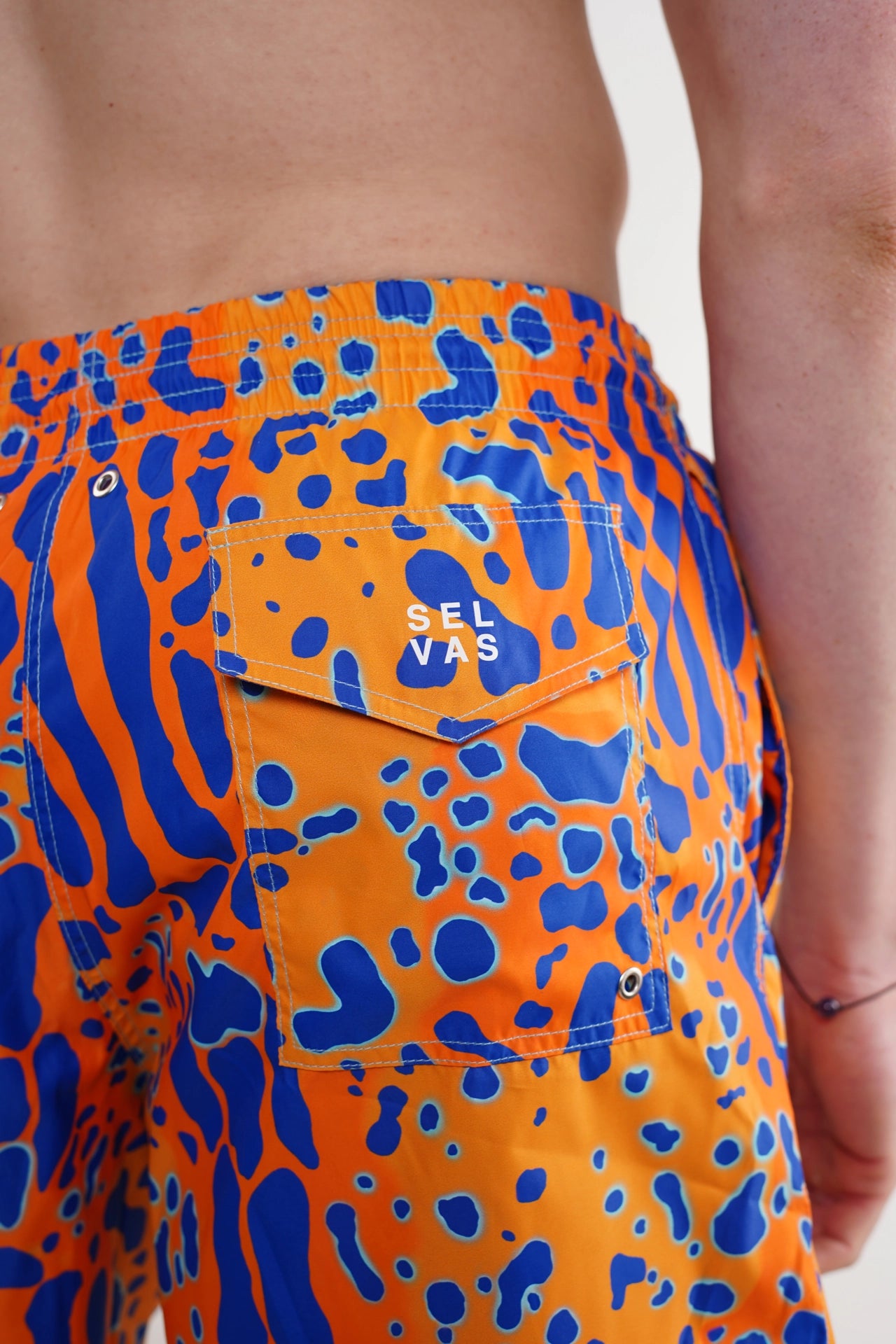 SHORTS RANA NARANJA